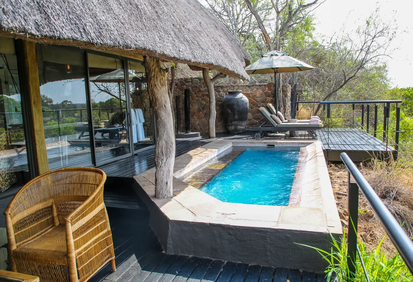 Exclusive-use villa with private plunge pool and thatched deck overlooking the bush